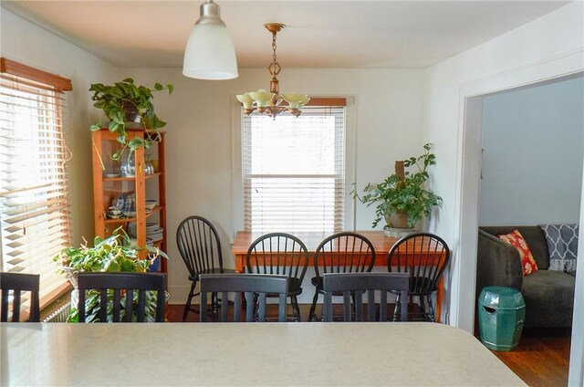 265 Main St, Delhi, NY 13753 - dining area featuring a chandelier and wood finished floors