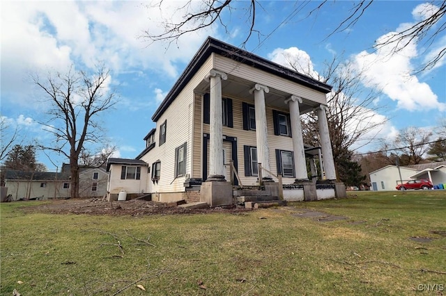 view of front of house with a front lawn and a porch