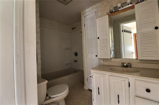 full bathroom with  shower combination, toilet, and vanity