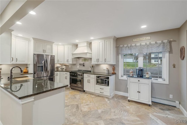 20 Youman Rd, Constantia, NY 13028 - kitchen featuring appliances with stainless steel finishes, custom range hood, a baseboard radiator, baseboards, and recessed lighting
