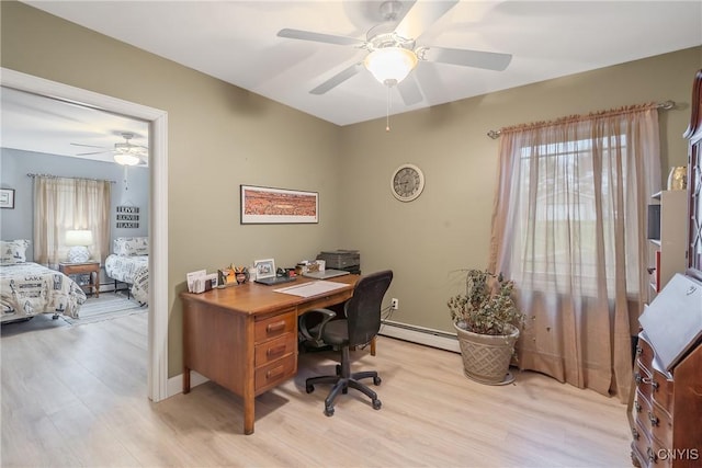 20 Youman Rd, Constantia, NY 13028 - office with a baseboard heating unit, ceiling fan, light wood-style flooring, and plenty of natural light