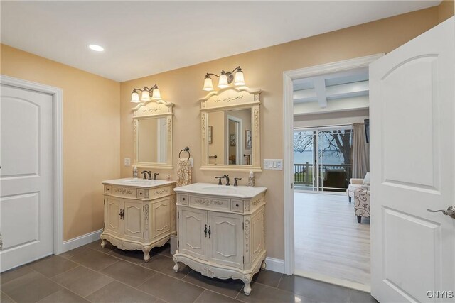 20 Youman Rd, Constantia, NY 13028 - bathroom featuring baseboards, two vanities, tile patterned floors, and recessed lighting