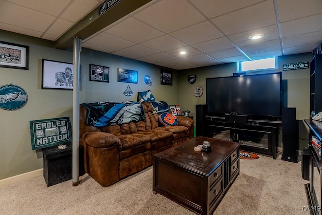 living room with baseboards, recessed lighting, a paneled ceiling, and light colored carpet