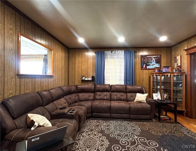living area featuring wooden walls and wood finished floors