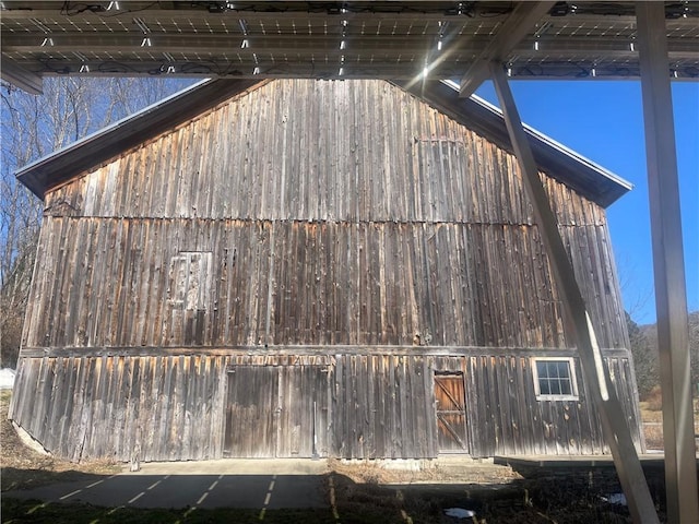 exterior space with an outdoor structure and a barn