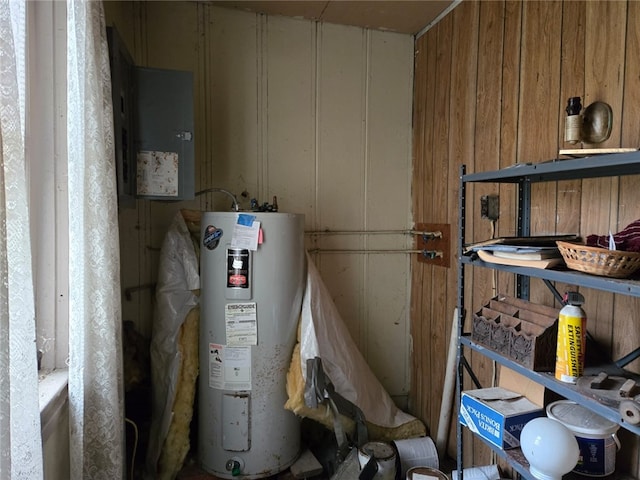 utility room featuring water heater