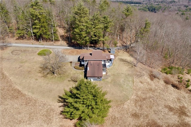 aerial view featuring a view of trees