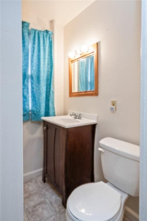 179 S W St, Geneva-City, NY 14456 - bathroom with toilet, tile patterned floors, and vanity