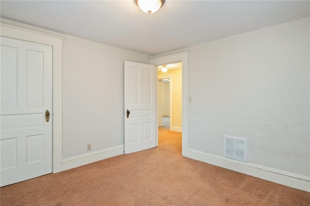 179 S W St, Geneva-City, NY 14456 - empty room featuring baseboards, light colored carpet, and visible vents
