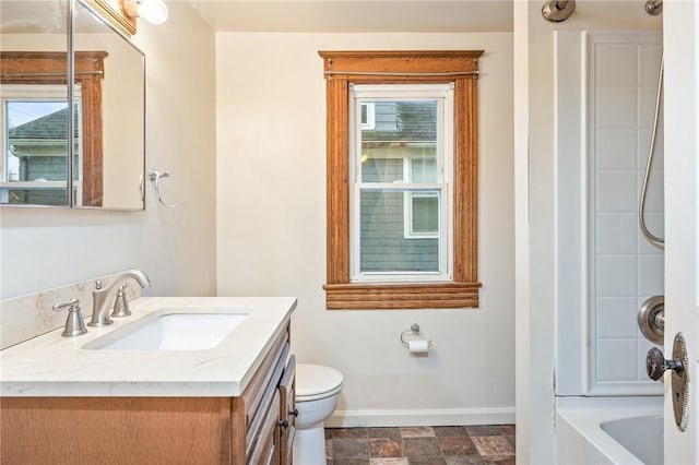 179 S W St, Geneva-City, NY 14456 - full bathroom with baseboards, toilet, a healthy amount of sunlight, and vanity