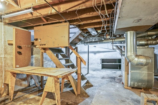 179 S W St, Geneva-City, NY 14456 - unfinished below grade area featuring stairs and heating unit