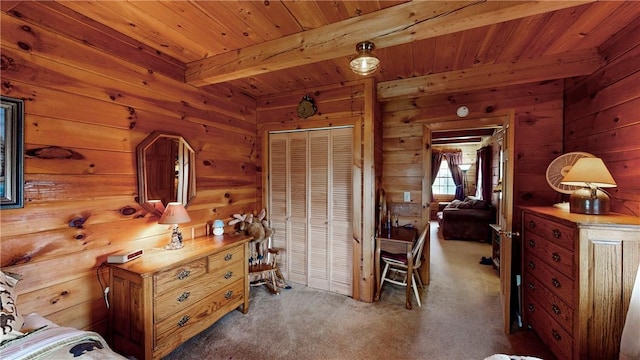 7061 Velie Rd, Bath, NY 14879 - carpeted bedroom with beamed ceiling, wooden walls, and wooden ceiling