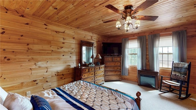 7061 Velie Rd, Bath, NY 14879 - carpeted bedroom with wooden ceiling, wood walls, and a ceiling fan