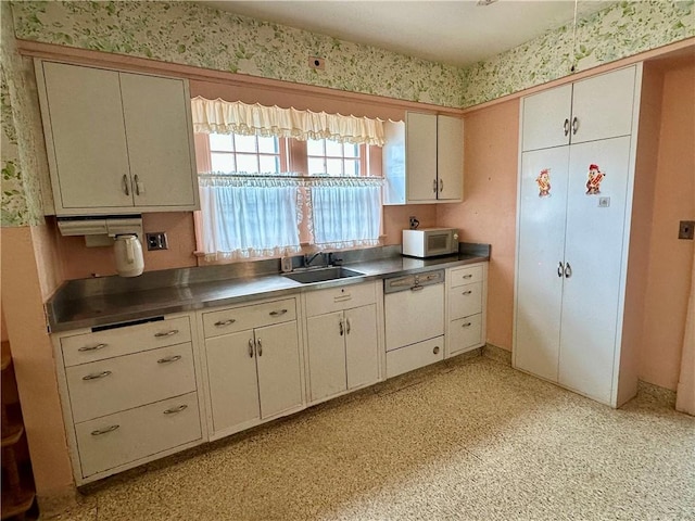 174 N Bennett St, Bradford-City, PA 16701 - kitchen with white appliances, a sink, wallpapered walls, and stainless steel countertops