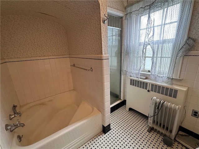 174 N Bennett St, Bradford-City, PA 16701 - full bath featuring radiator, wallpapered walls, a garden tub, tile walls, and a shower