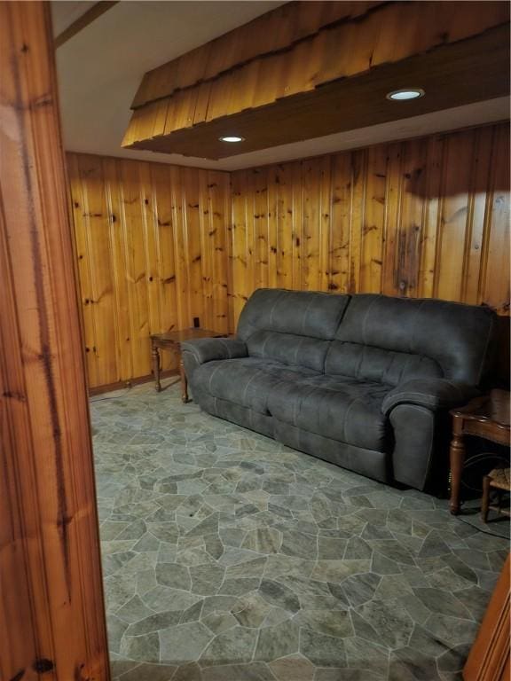305 State St, Smethport-Borough, PA 16749 - living area with stone flooring and wooden walls