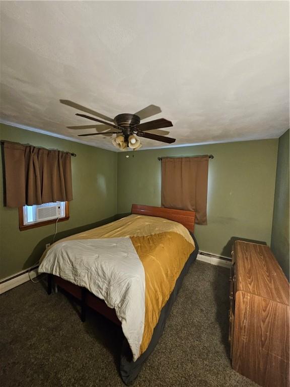 305 State St, Smethport-Borough, PA 16749 - bedroom with baseboards, carpet floors, ceiling fan, and a baseboard heating unit