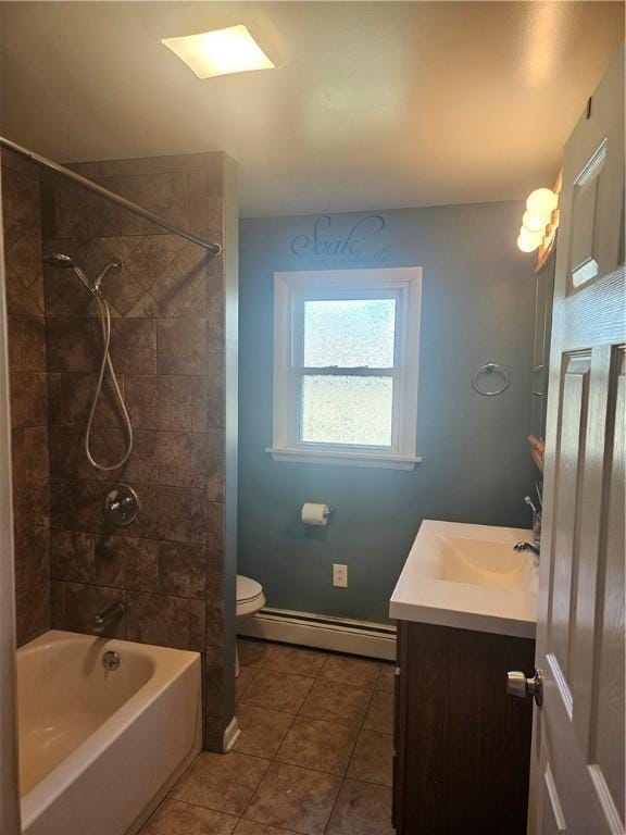 305 State St, Smethport-Borough, PA 16749 - bathroom featuring a baseboard radiator, baseboards, toilet, vanity, and tile patterned flooring