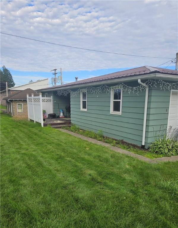 305 State St, Smethport-Borough, PA 16749 - back of house with a yard