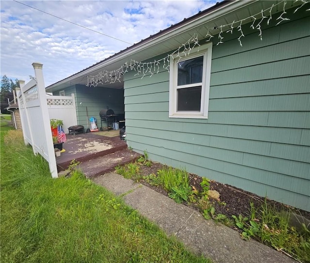 305 State St, Smethport-Borough, PA 16749 - view of home's exterior with fence and a patio area