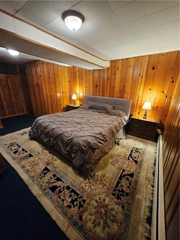 305 State St, Smethport-Borough, PA 16749 - bedroom featuring wood walls