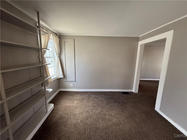 318 Academy St, Watertown-City, NY 13601 - unfurnished room featuring dark carpet and baseboards