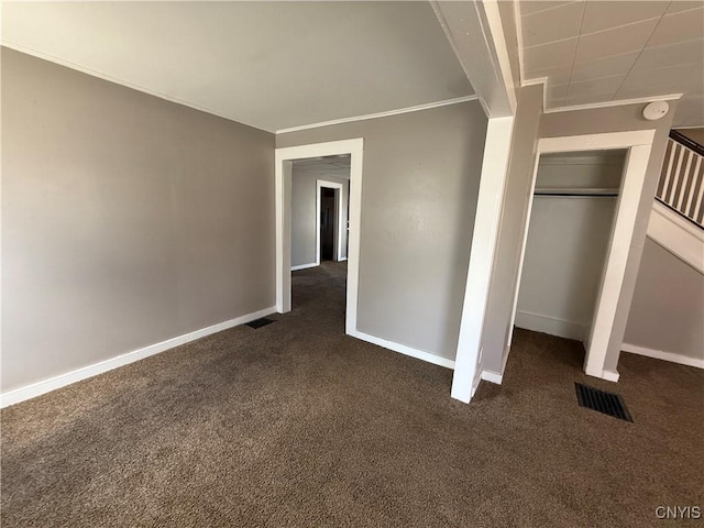 318 Academy St, Watertown-City, NY 13601 - unfurnished bedroom with dark colored carpet and baseboards