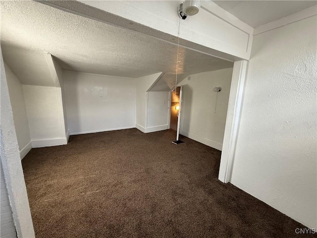 318 Academy St, Watertown-City, NY 13601 - bonus room with dark carpet and a textured ceiling