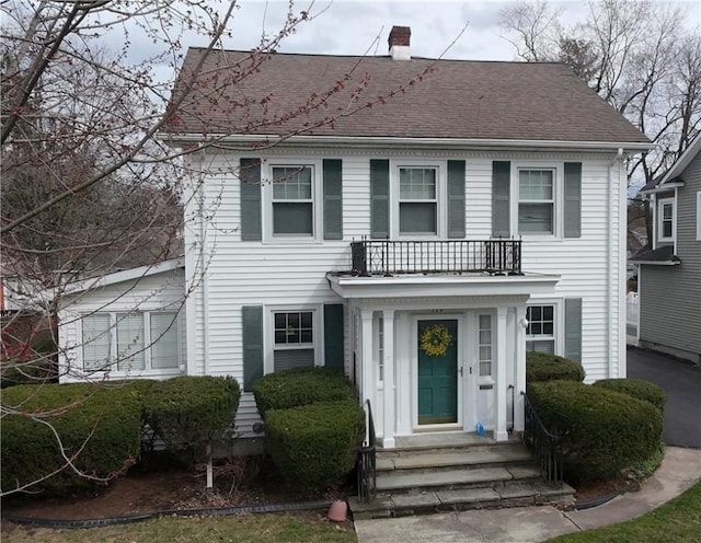 114 Country Club Dr, Elmira, NY 14905 - view of front facade with a shingled roof and a chimney