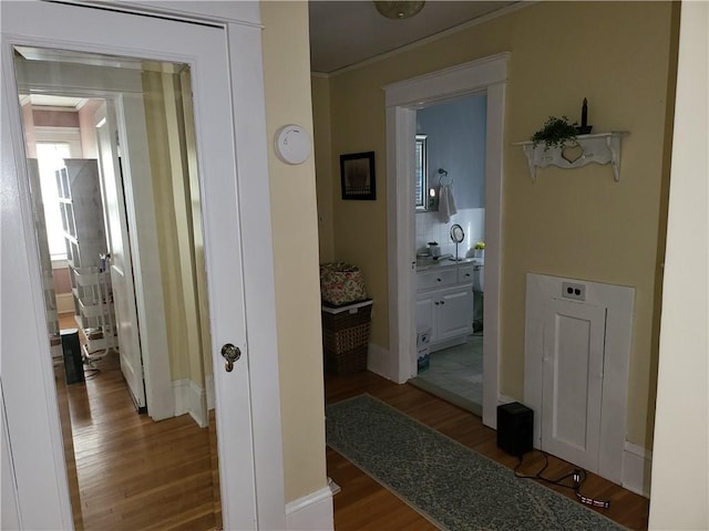 114 Country Club Dr, Elmira, NY 14905 - corridor with baseboards, ornamental molding, and wood finished floors