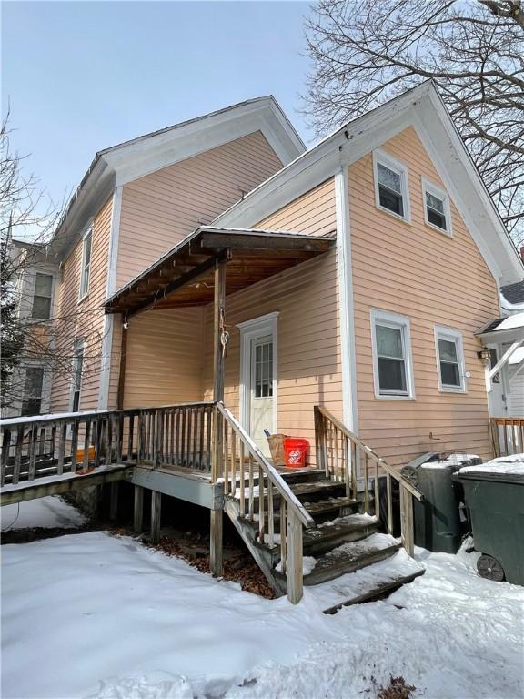 view of snow covered house