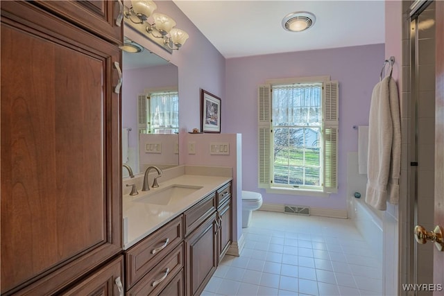 7131 Lakeshore Ter, Newfane, NY 14008 - full bathroom featuring toilet, a shower with shower door, baseboards, tile patterned flooring, and vanity