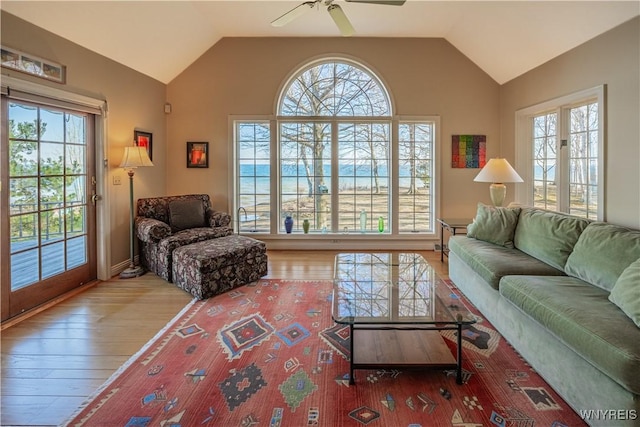 7131 Lakeshore Ter, Newfane, NY 14008 - living area with a ceiling fan, wood-type flooring, and vaulted ceiling