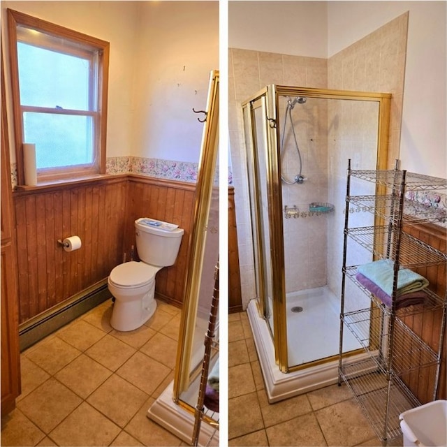 bathroom featuring a wainscoted wall, a baseboard radiator, a stall shower, and tile patterned flooring