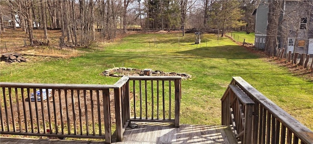 view of yard featuring a wooden deck