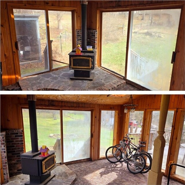 sunroom / solarium with a wood stove