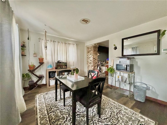 717 Spaulding St, Elmira-City, NY 14904 - dining area with wood finished floors and baseboards