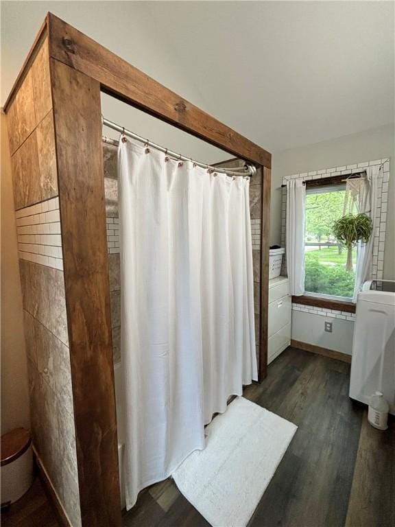 717 Spaulding St, Elmira-City, NY 14904 - full bath featuring wood finished floors, curtained shower, and toilet