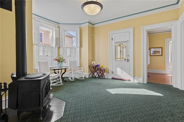 280 S Main St, Canandaigua-City, NY 14424 - miscellaneous room featuring ornamental molding, carpet, and a wood stove