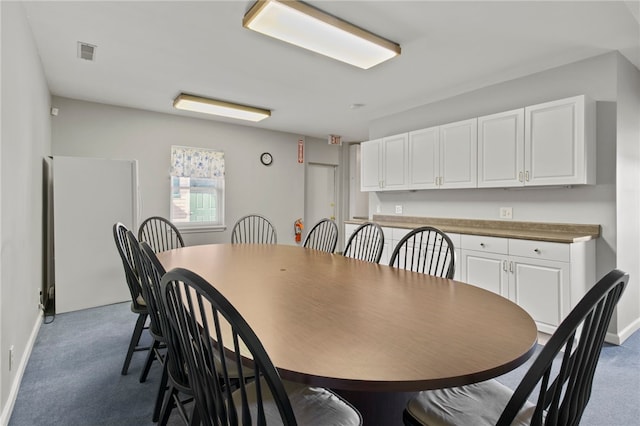280 S Main St, Canandaigua-City, NY 14424 - carpeted dining space with baseboards and visible vents