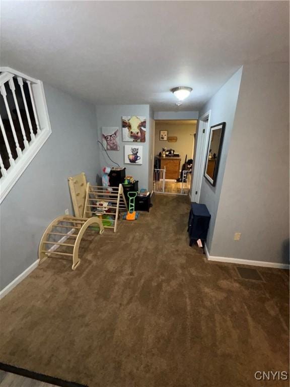 439 S Mechanic St, Wilna, NY 13619 - dining room featuring carpet flooring, stairway, and baseboards