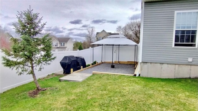 view of yard featuring a fenced backyard