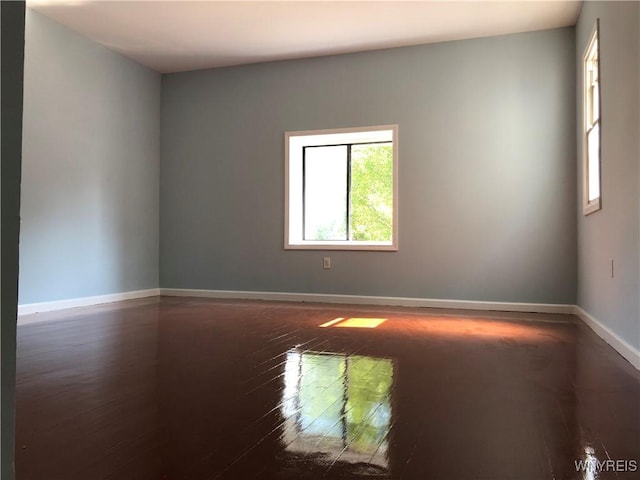 202 Thompson St, Buffalo, NY 14207 - unfurnished room featuring dark wood-style flooring and baseboards