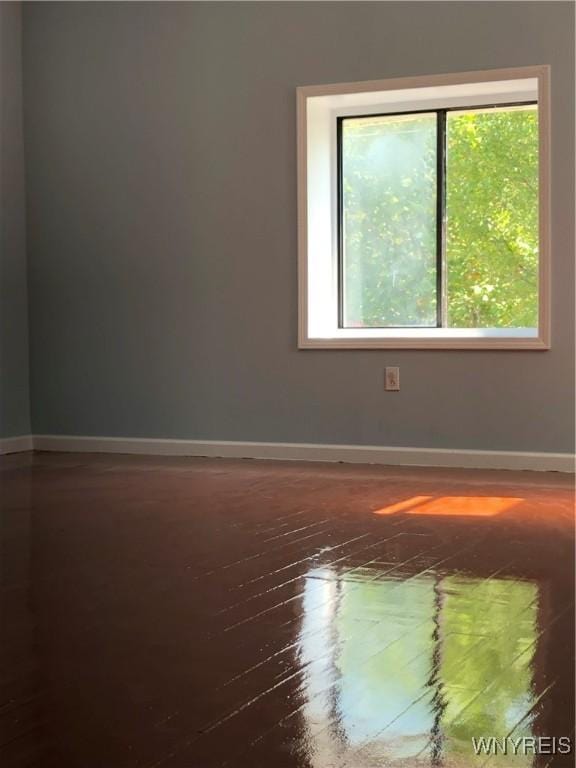 202 Thompson St, Buffalo, NY 14207 - empty room with baseboards and wood finished floors