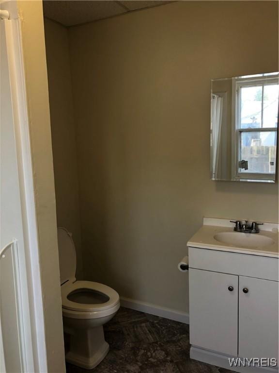 202 Thompson St, Buffalo, NY 14207 - bathroom with toilet, vanity, and baseboards