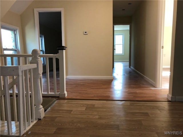 202 Thompson St, Buffalo, NY 14207 - hallway featuring wood finished floors, an upstairs landing, and baseboards