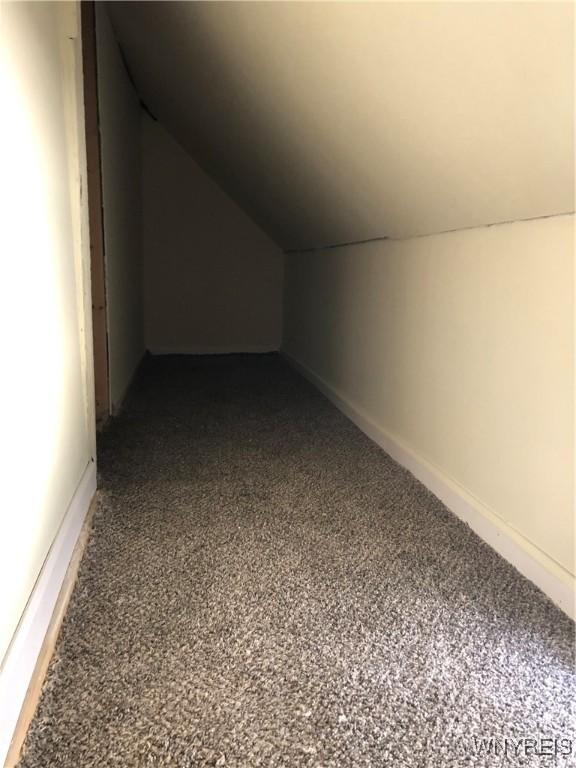 202 Thompson St, Buffalo, NY 14207 - bonus room with vaulted ceiling, baseboards, and carpet