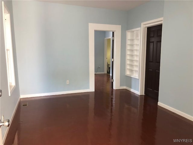 202 Thompson St, Buffalo, NY 14207 - unfurnished bedroom featuring baseboards and wood finished floors