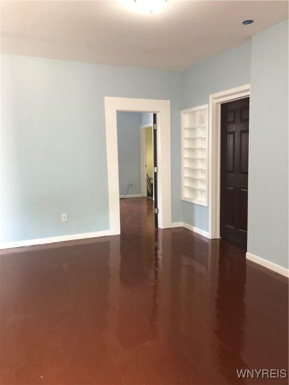 202 Thompson St, Buffalo, NY 14207 - spare room with baseboards and wood finished floors