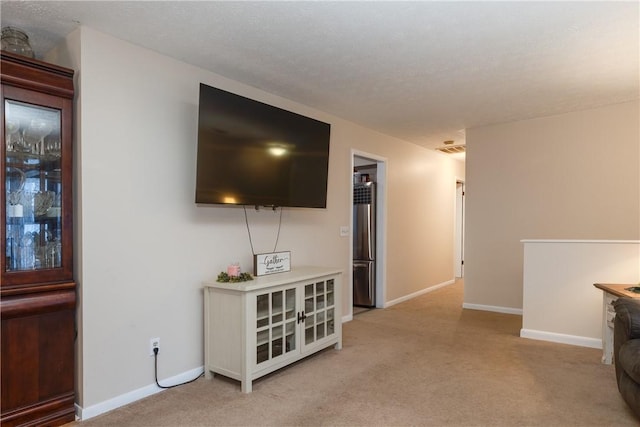 31 Briarcliff Dr, Horseheads, NY 14845 - living area featuring baseboards, visible vents, and light colored carpet